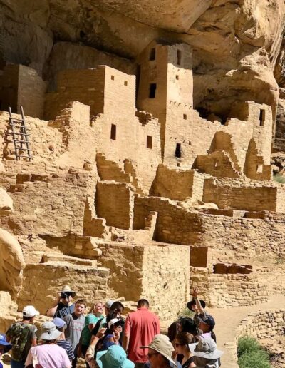 ranger-led tour of stonemasonry village built into alcove