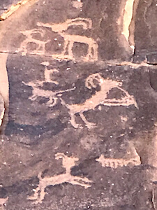 bighorn sheep playing flute petroglyph